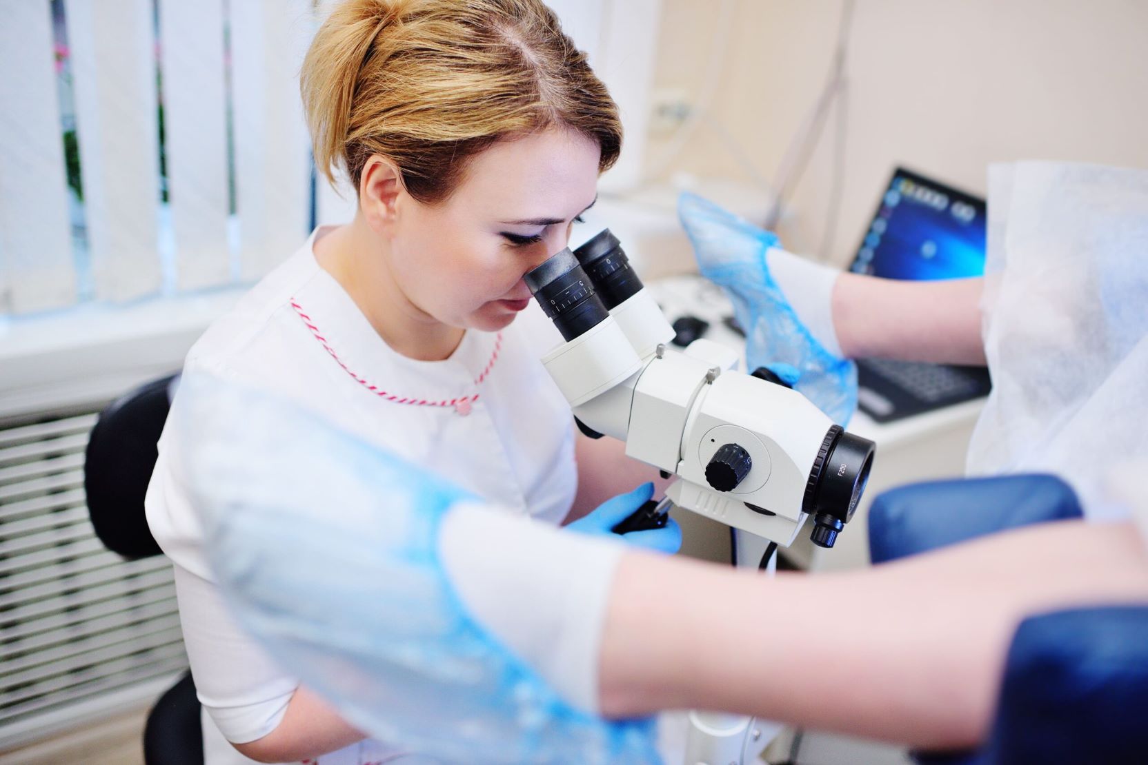 Colposcopy | Doctor examining a patient